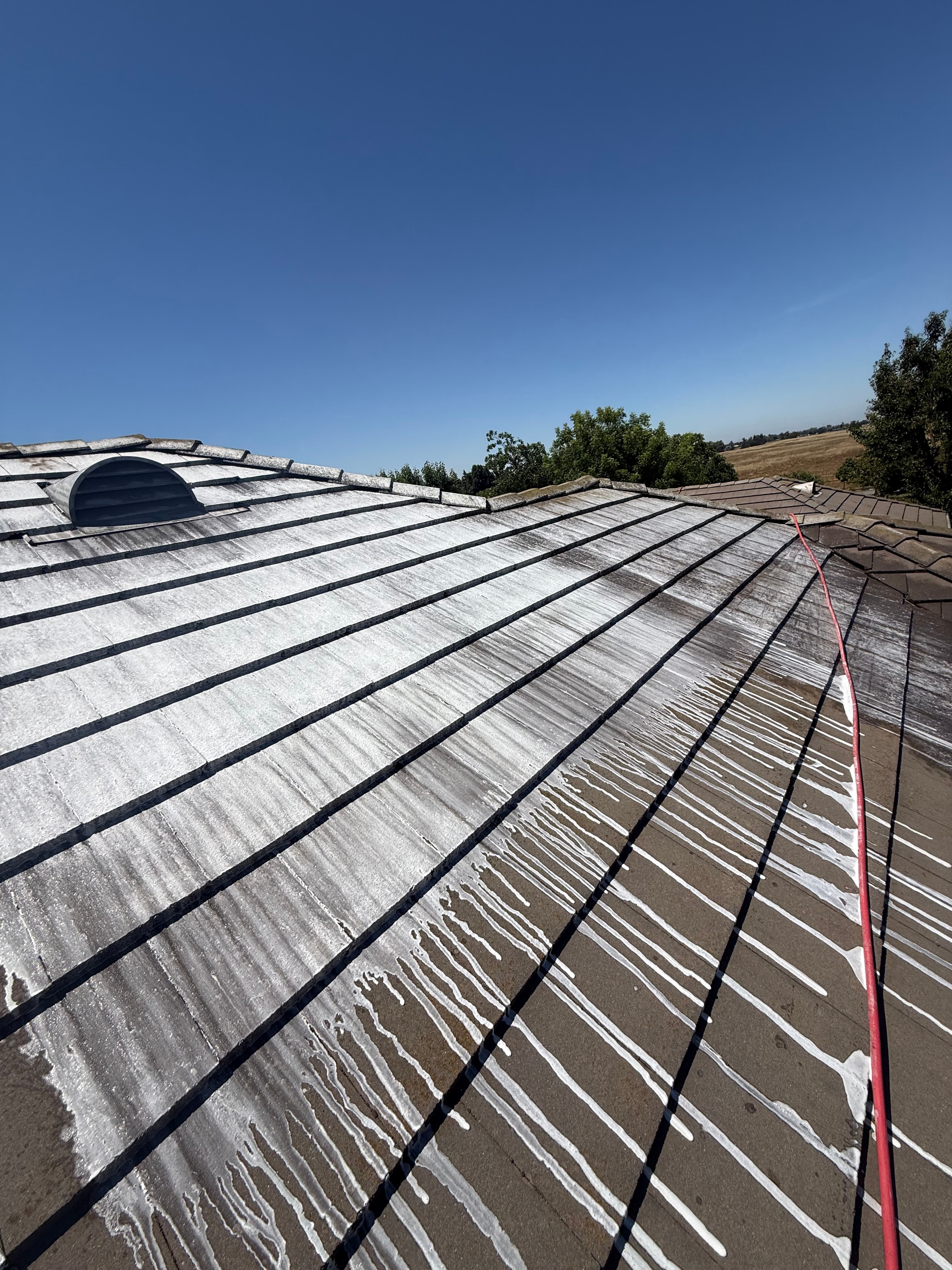 Roof detail beneath a clear sky